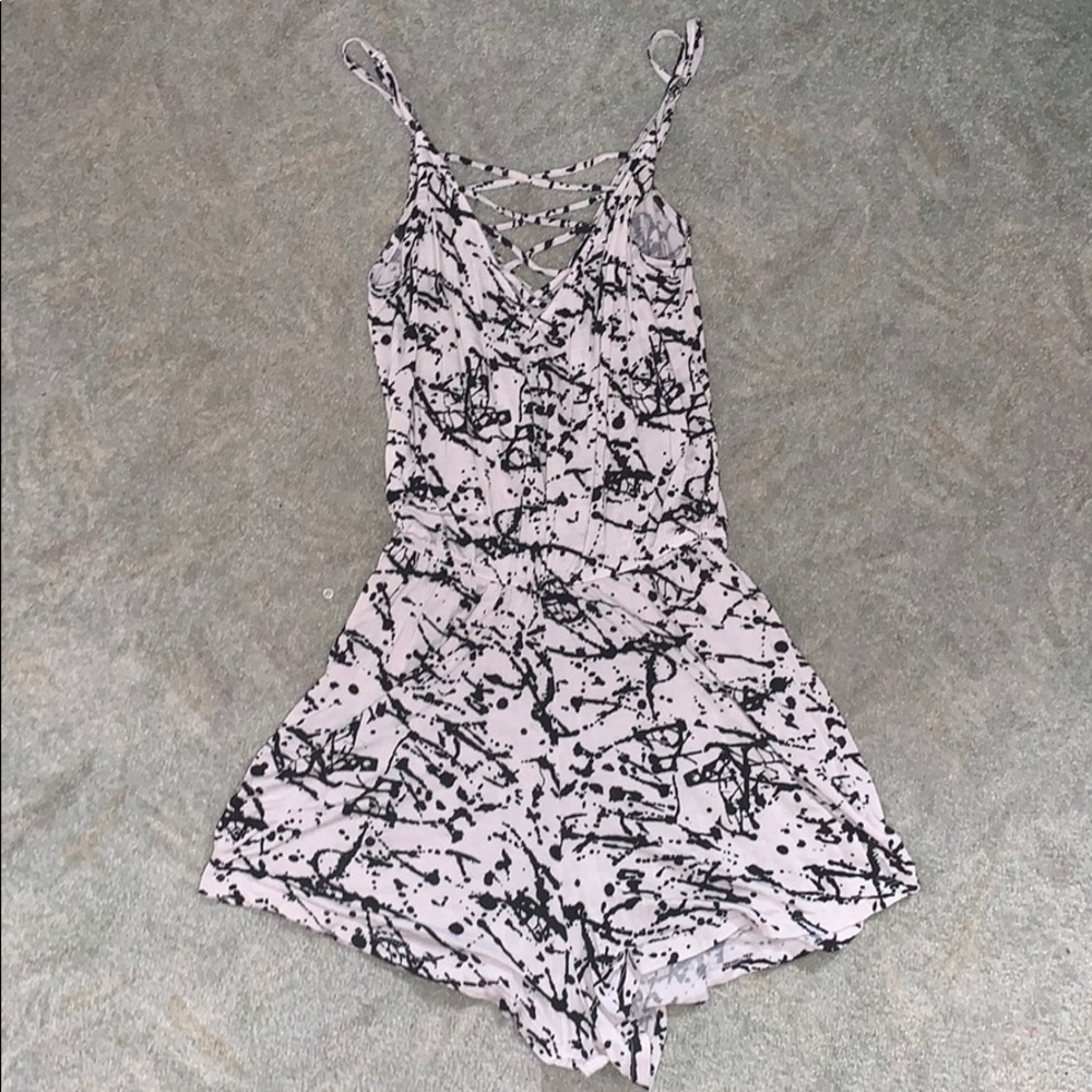 Black and white splattered lace up romper.
